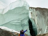 22 Jerome Ryan Points At True Glacier Below The Rubble On The Upper Baltoro Glacier